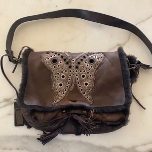 Vintage gently used brown suede Dolce and Gabbana Butterfly Messenger Bag.